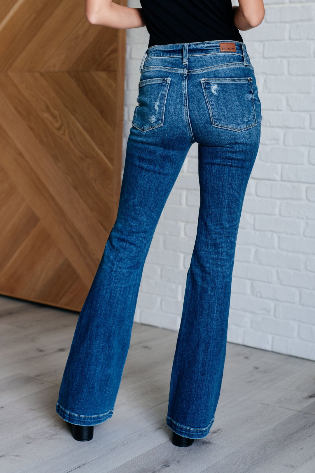 Judy Blue - Mid Rise Distressed Button Fly Flare Jeans - Inspired Eye Boutique